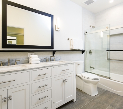 a room with a sink and a mirror