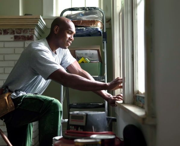 a person sitting in front of a window
