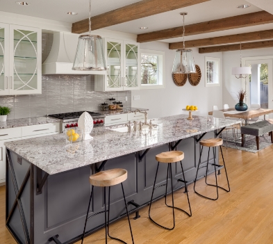 a kitchen with an island in the middle of a room